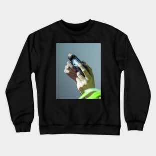 Girl hands with gamer joystick for videogame console Crewneck Sweatshirt